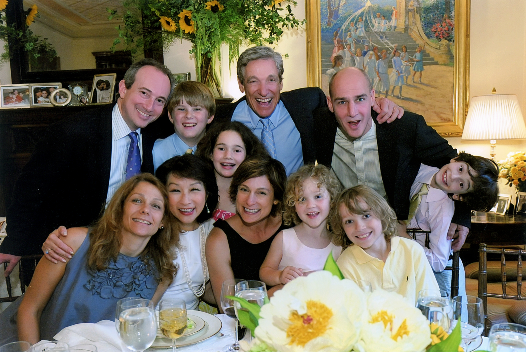 Family photo at bar mitzvah of Connie Chung's son, Matthew Povich. Chung's husband, Maury Povich, is in the top middle. 2008. Photo by Bryan Blanken for Freed Photography.